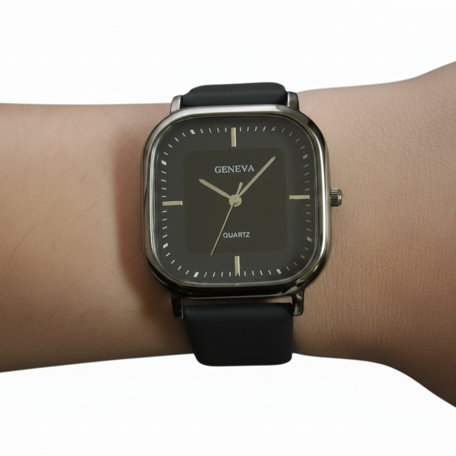 Black wristwatch with 'Geneva' branding on a wrist against a blue background